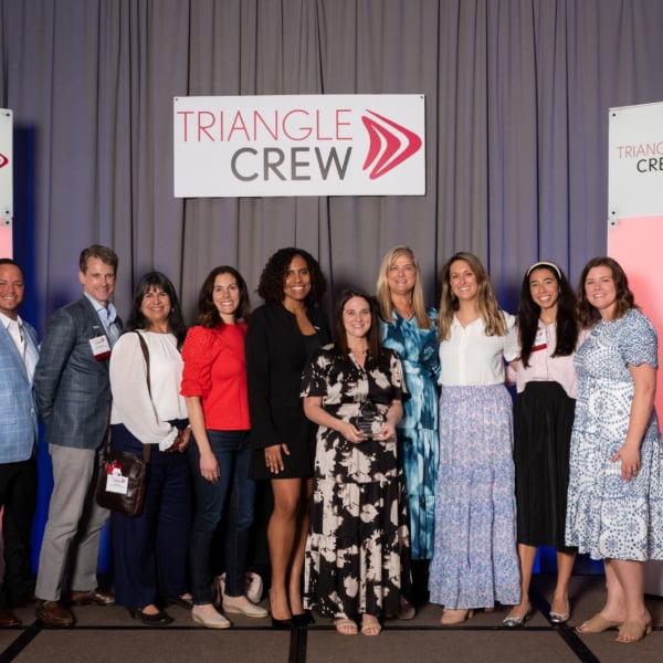 Group photo of RTF team members and Horseshoe restauranteurs accepting the “Best Development Project” award at the 2025 TCREW Champion Awards.