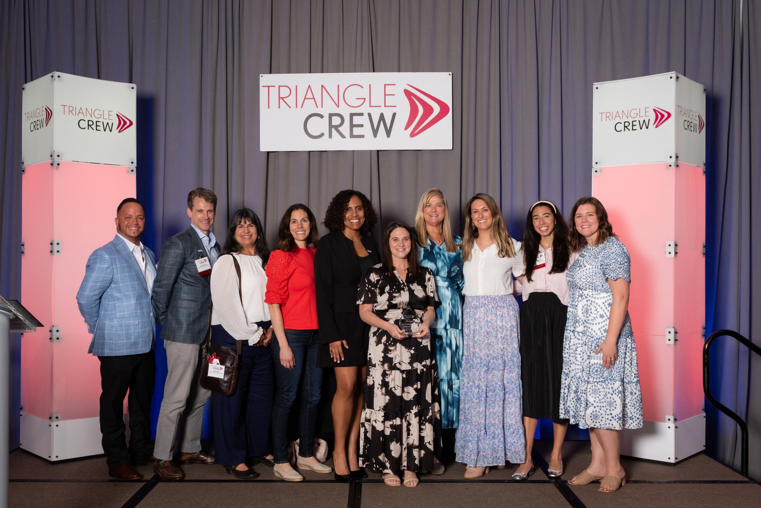 Group photo of RTF team members and Horseshoe restauranteurs accepting the “Best Development Project” award at the 2025 TCREW Champion Awards.